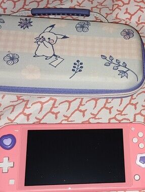 Nintendo Switch Lite And Luigi's Mansion 3